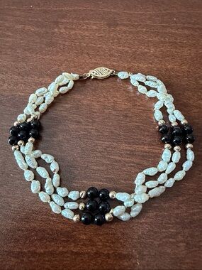 Solid 14K gold multi strand bracelet river pearls and onyx